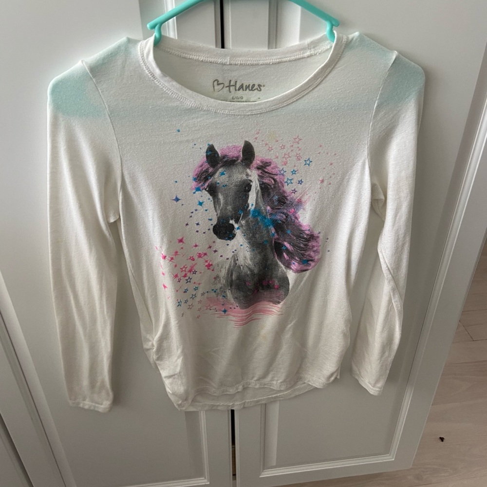 White long sleeve shirt with a unicorn on it